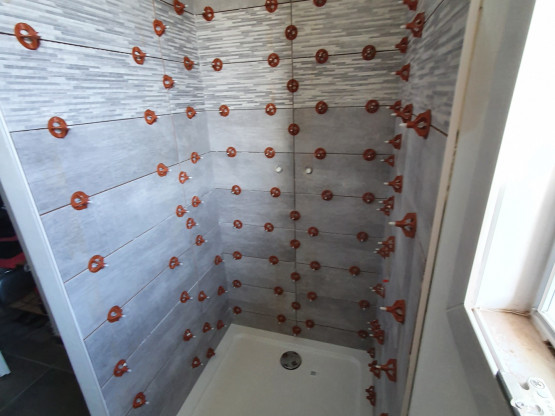 Rénovation d'une douche à l'identique après une fuite d'eau